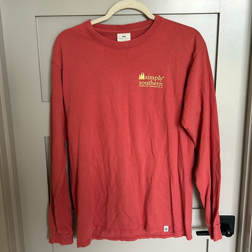 Medium orangish pinkish long sleeve shirt